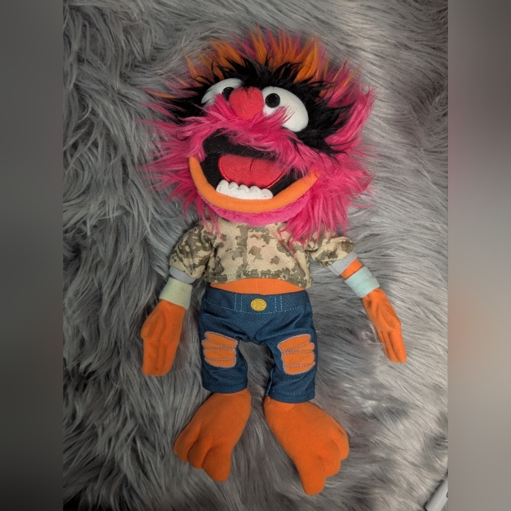 Plush Animal Toy with Pink and Orange Accents